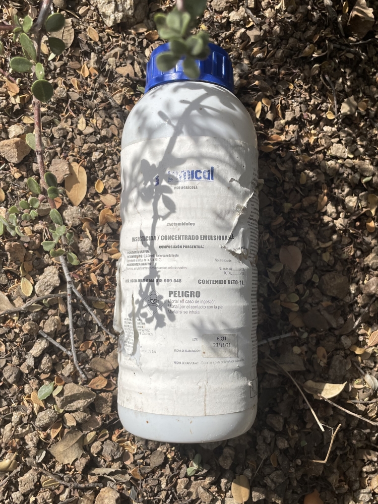 A container of methamidophos, a toxic organophosphate pesticide, found at an illegal cannabis grow site in San Bernardino County